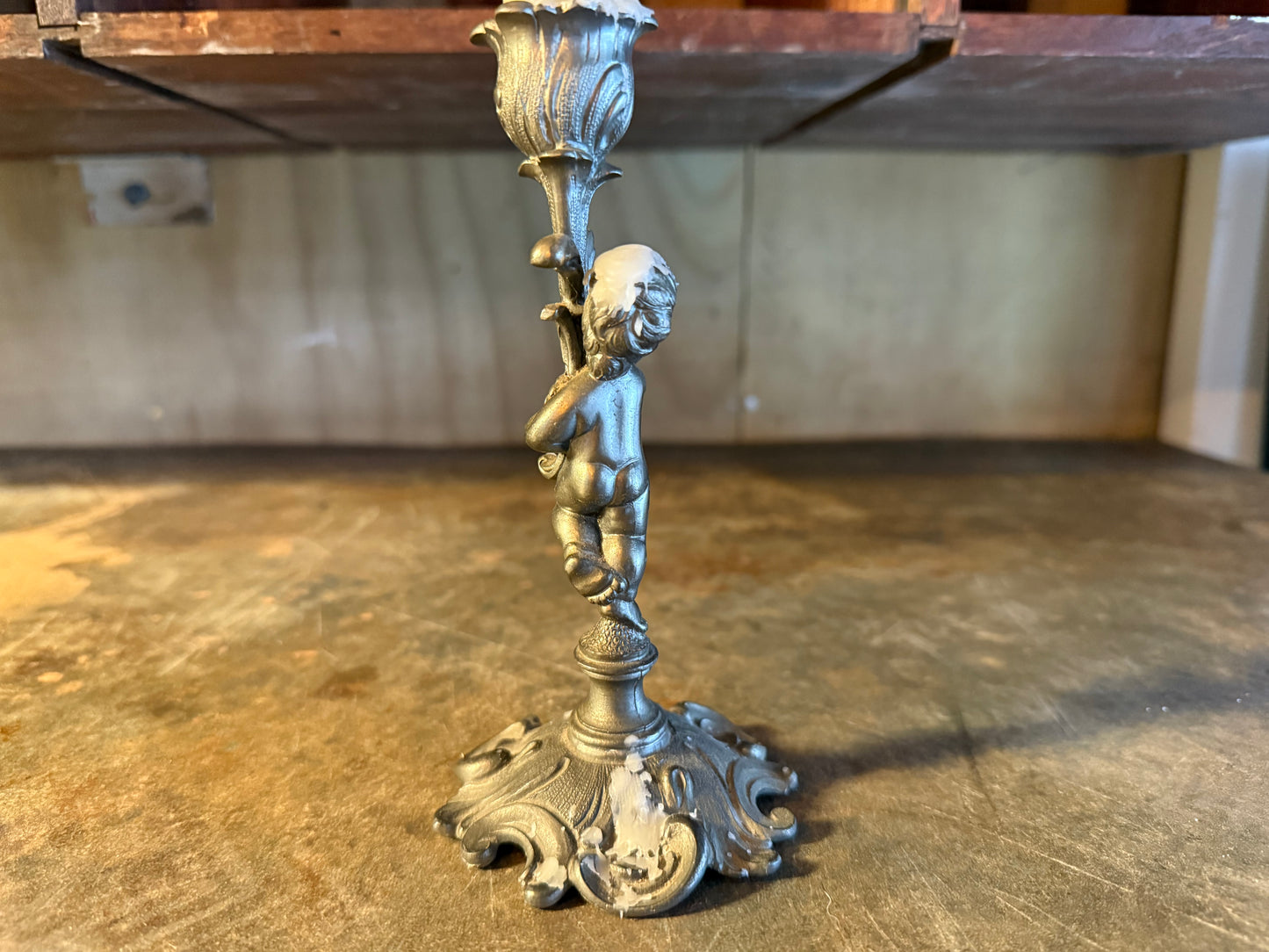 Cherub candlestick holder