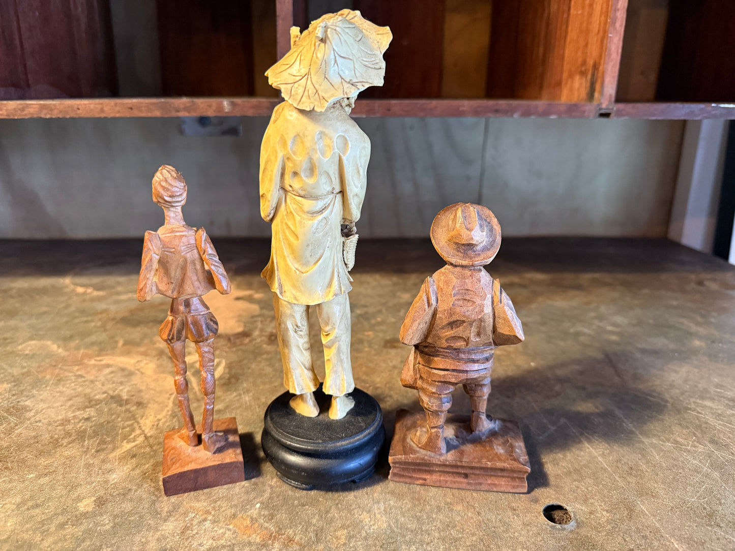 Trio of carved fellas