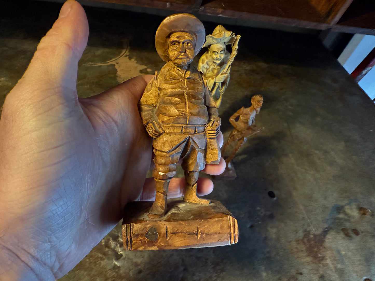 Trio of carved fellas