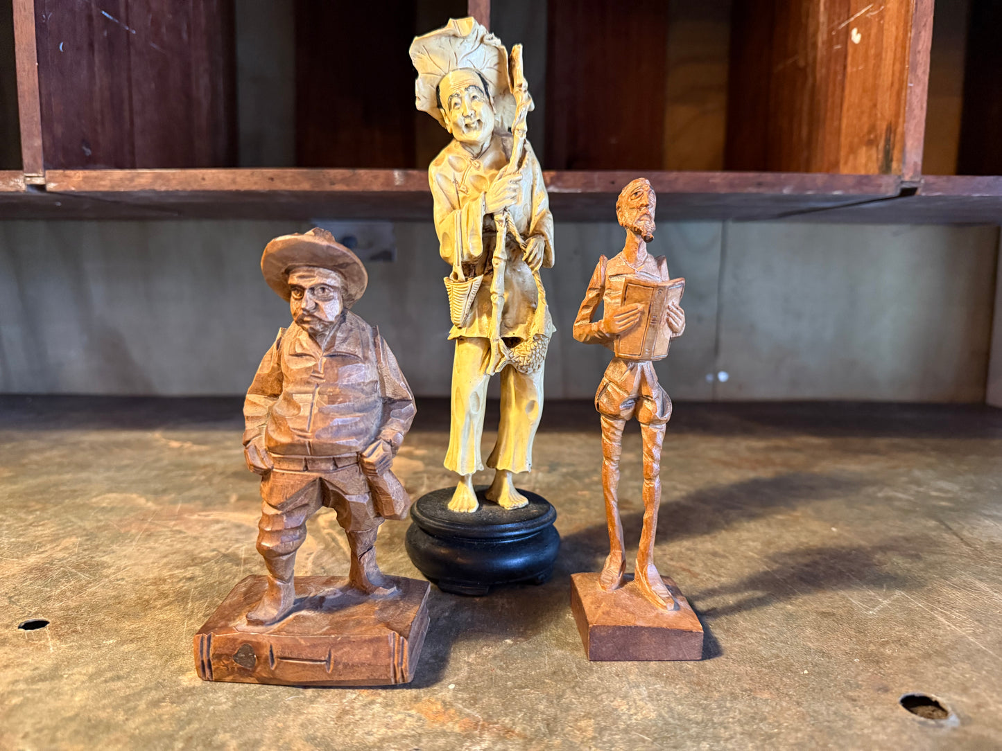 Trio of carved fellas
