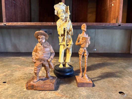 Trio of carved fellas