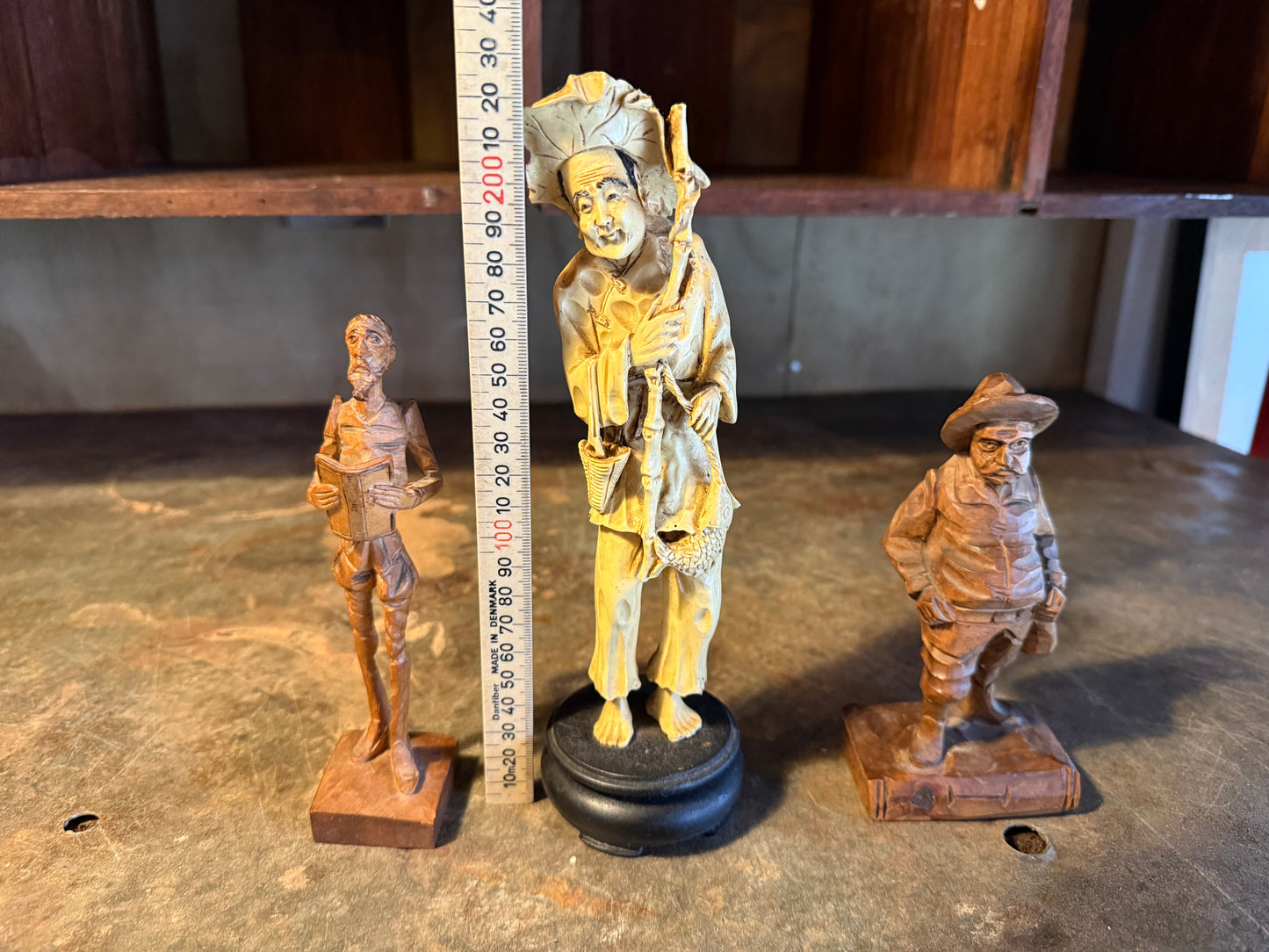 Trio of carved fellas